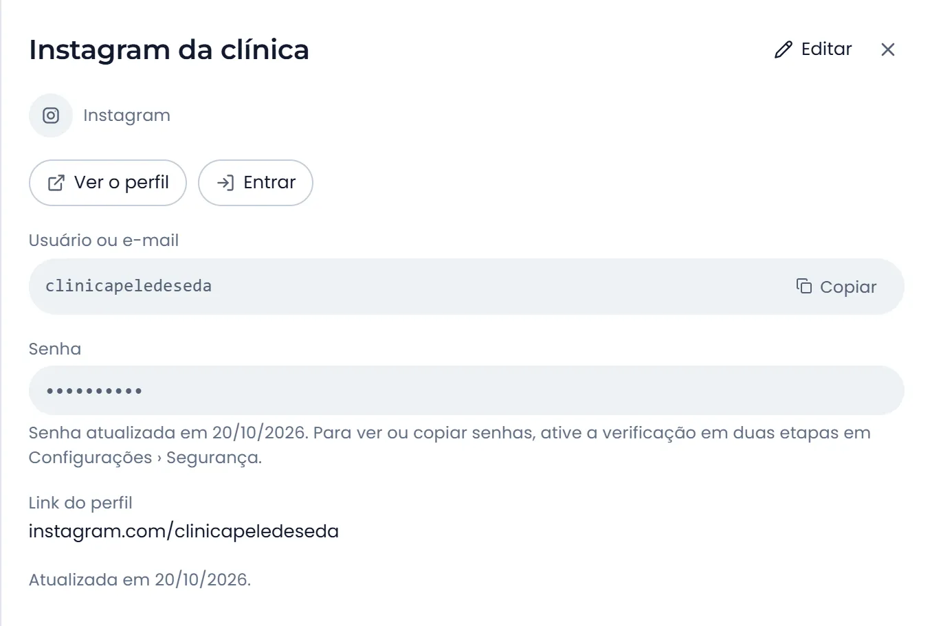 Credencial do Instagram no cofre do negócio: usuário, senha guardada cifrada e os botões Ver o perfil e Entrar